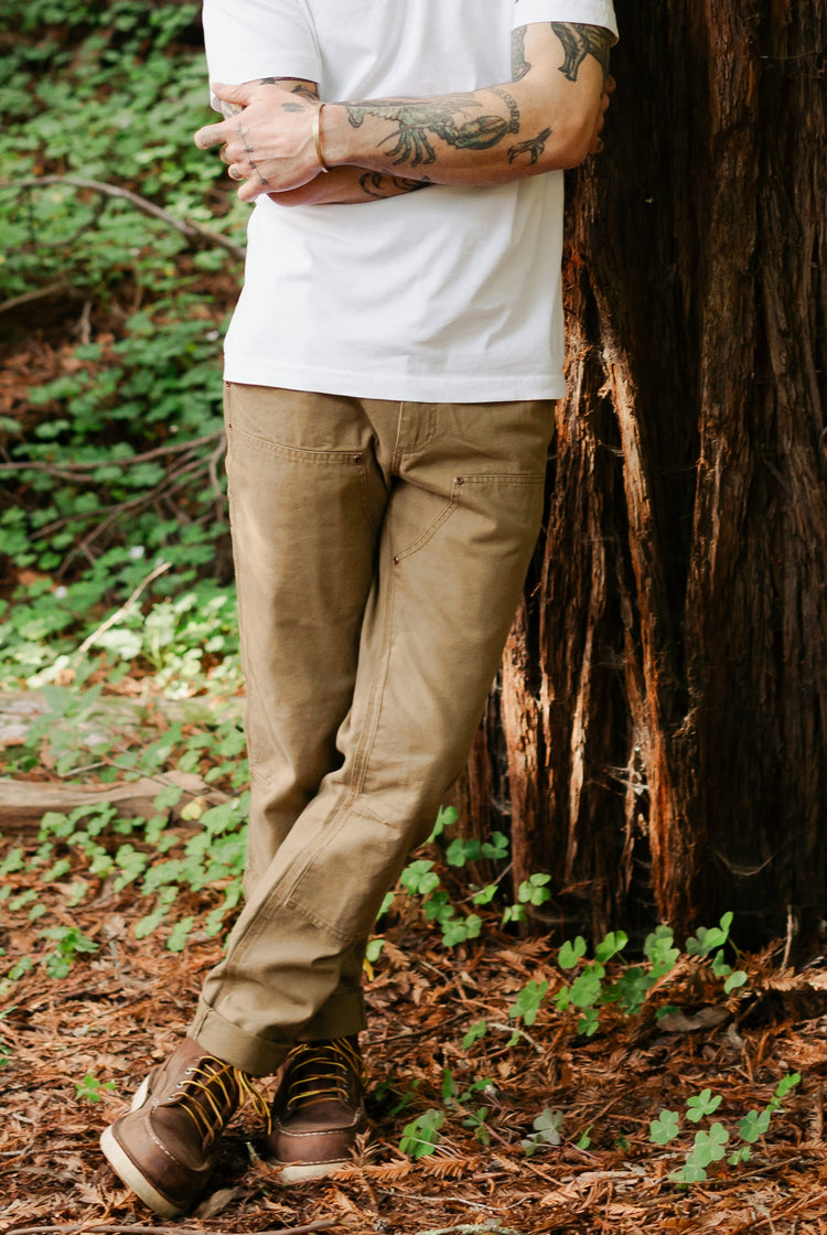 Men’s Draftsman Pant in salt washed Tobacco, featuring a double-front design with copper rivets and triple-needle stitching on 100% cotton canvas.