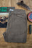 Flat-lay of the Tradesman Pant in salt washed Tobacco, featuring triple-needle reinforced seams, a custom VNTNA branded button, and 100% cotton canvas utility construction.